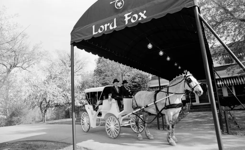 Historic Lord Fox restaurant with horse-drawn carriage